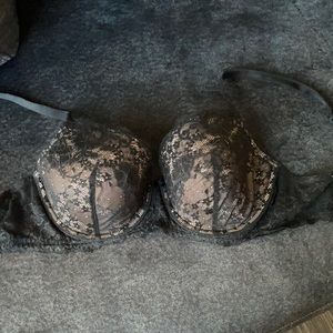 New Victoria Secret black lace bra with beige background